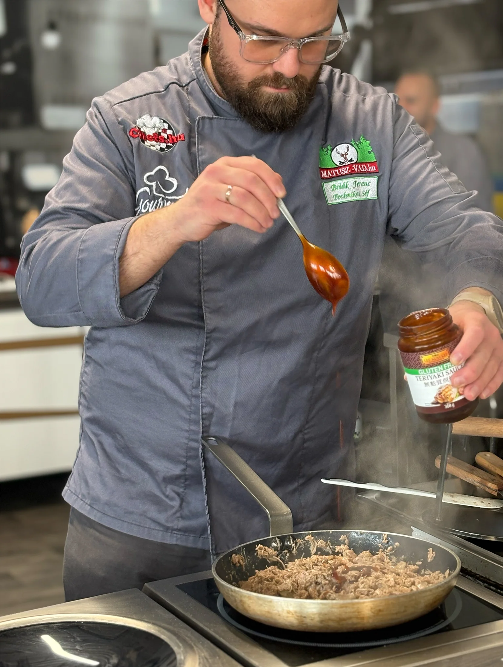 A chef using a GastroGenius product in a professional kitchen